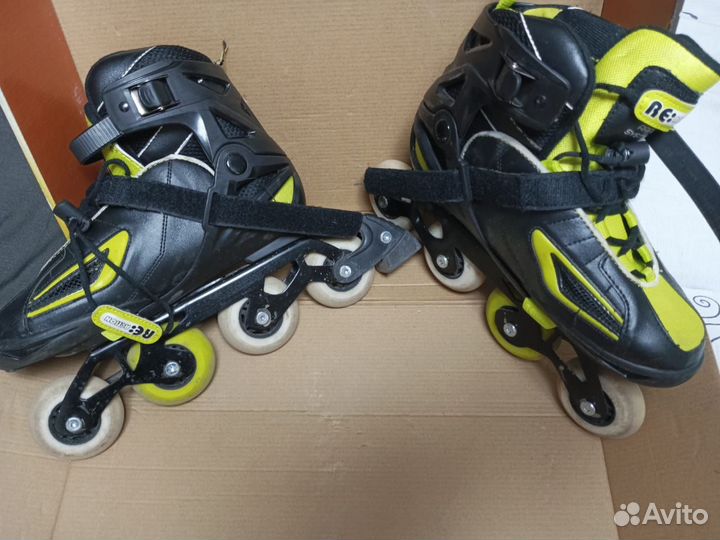 Роликовые коньки