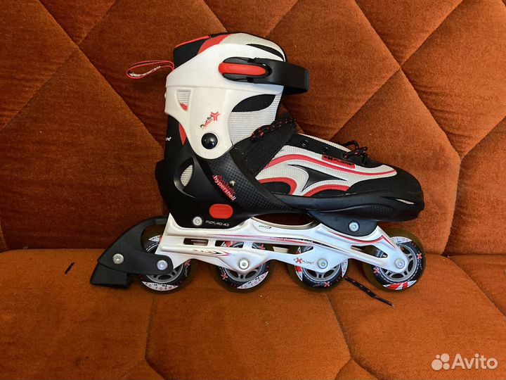 Роликовые коньки