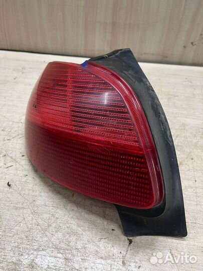 Фонарь задний левый Peugeot 206 хетчбек