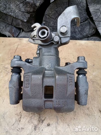 Задний тормозной суппорт Мазда 6 GG