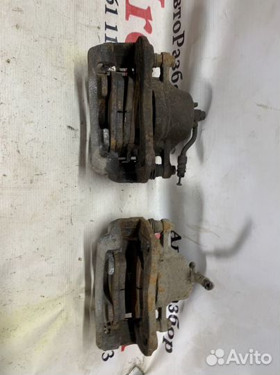 Суппорт передний левый RIO 3 solaris Kia