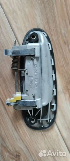 Ручка двери Carolla AE100