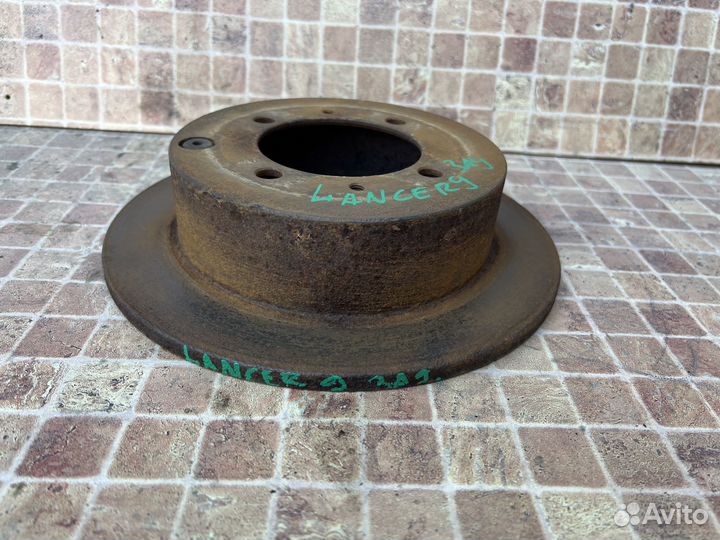 Тормозной диск задний Mitsubisi Lanser 9