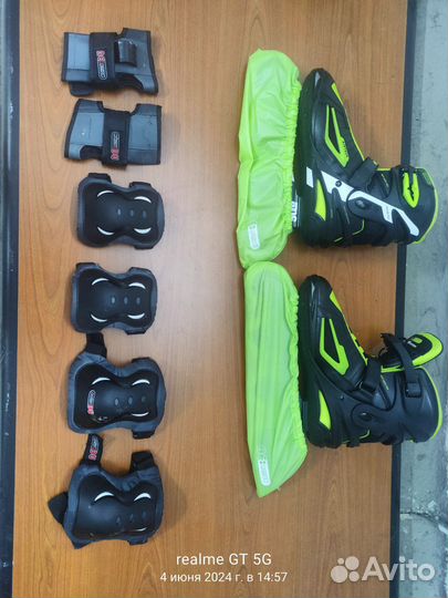 Роликовые коньки