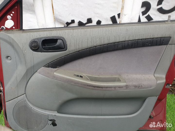 Обшивка двери передней правой Chevrolet Lacetti