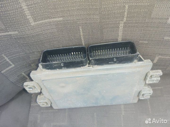 Блок управления двигателем Renault Logan LM05 K4M
