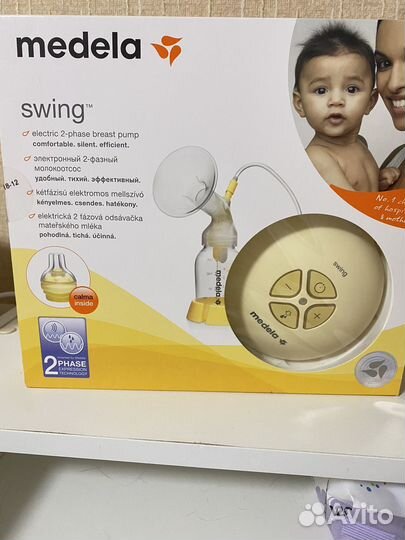 Молокоотсос электрический medela swing даухфазный