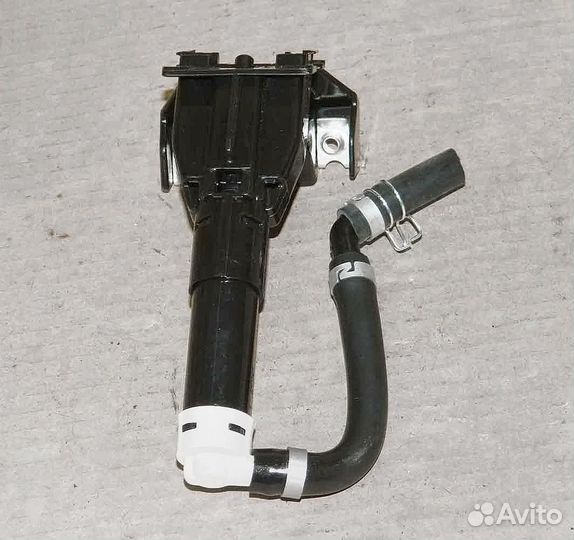 Форсунка омывателя фары Mitsubishi Outlander XL