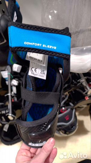 Налокотники хоккейные. Ботинки лыжные