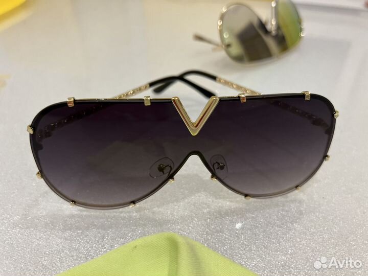 Солнечные очки женские