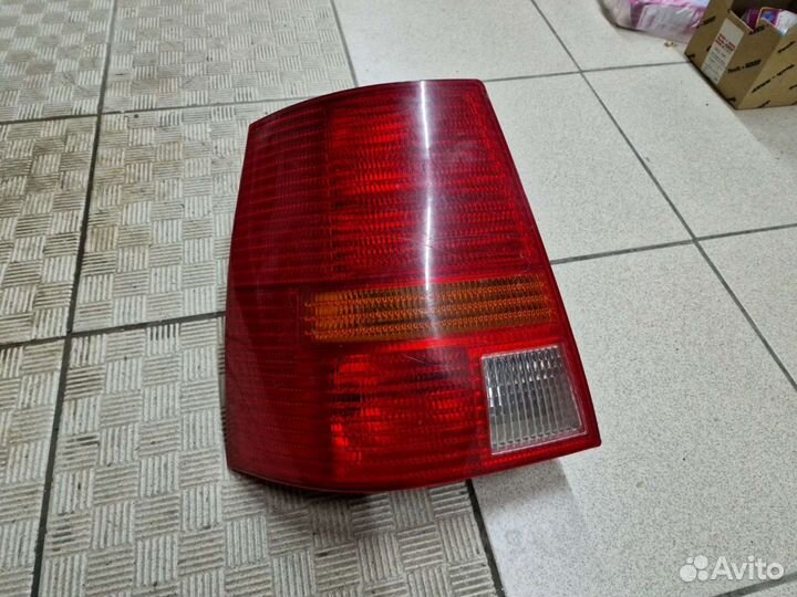 Фонарь задний левый VW Golf 4 Универсал оригинал
