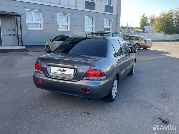 Mitsubishi Lancer 1.6 МТ, 2006, 238 381 км
