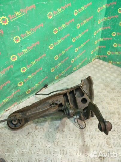 Кулак задний левый Mitsubishi Lancer 9 седан 1.6Л