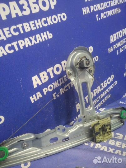 Задний правый стеклоподъемник Ford Focus 3 седан