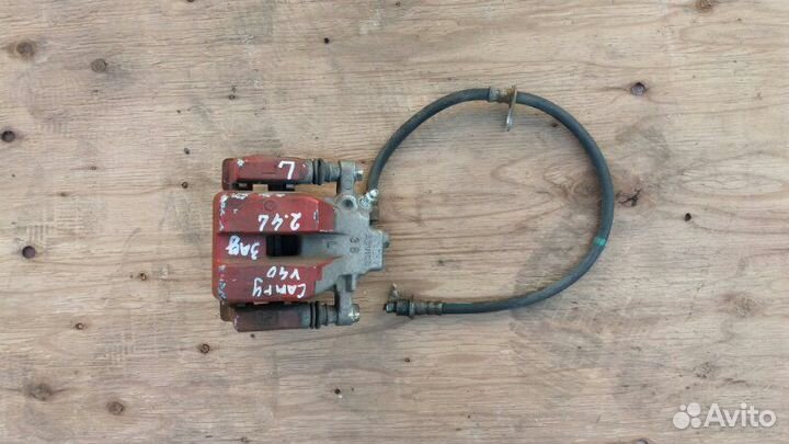 Суппорт тормозной левый Toyota Camry V40 2006-2011