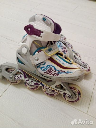 Роликовые коньки