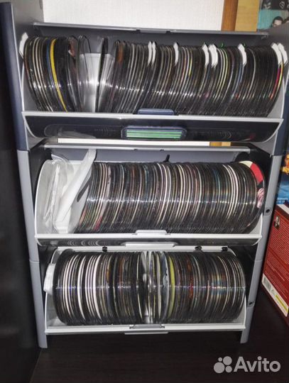 Фильмы на dvd и бокс для хранения dvd