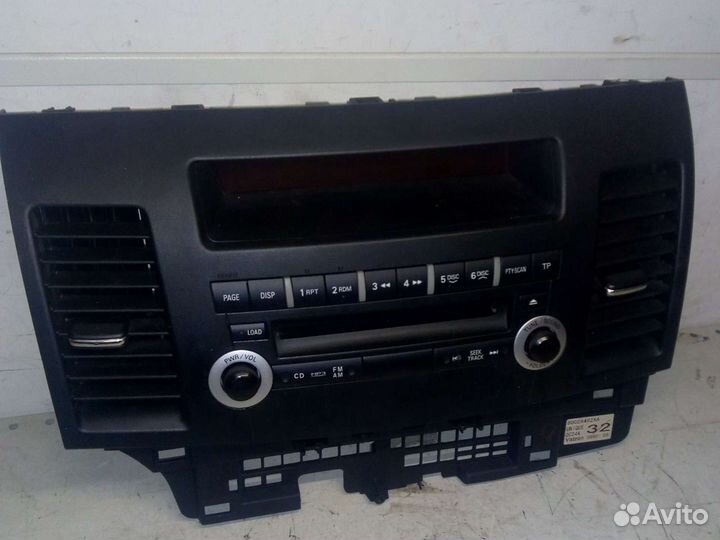 Панель управления Митцубиси Ланцер 10