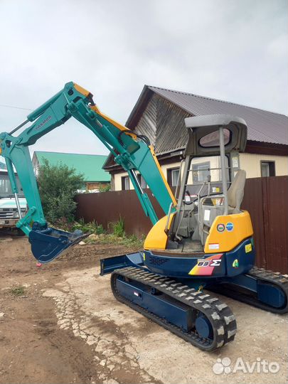 Мини-экскаватор