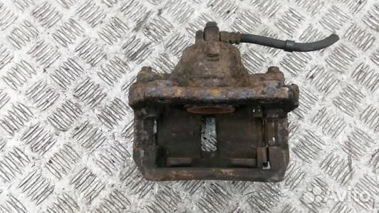 Суппорт тормозной передний правый nissan primera P