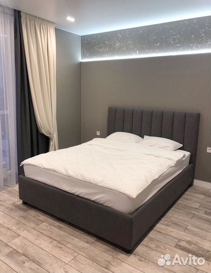 Кровать с подъемным механизмом