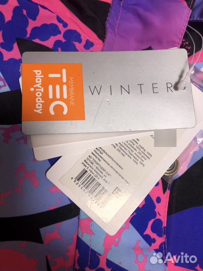 Горнолыжный женский комбинезон