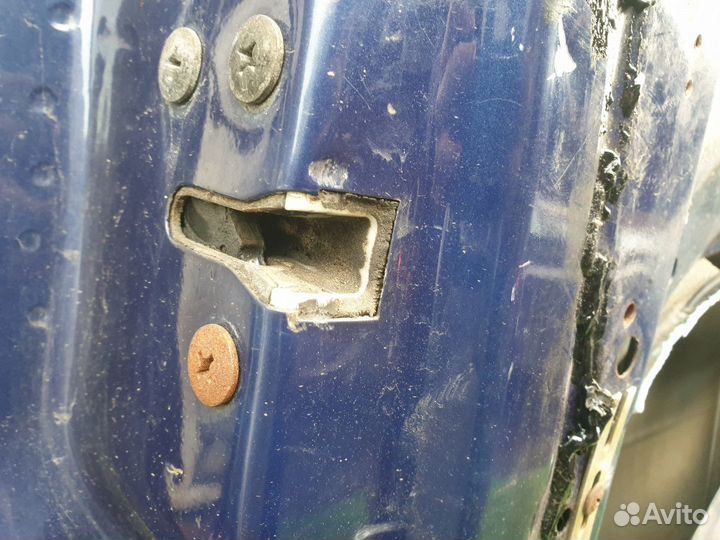 Замок двери передней левой Kia Sportage