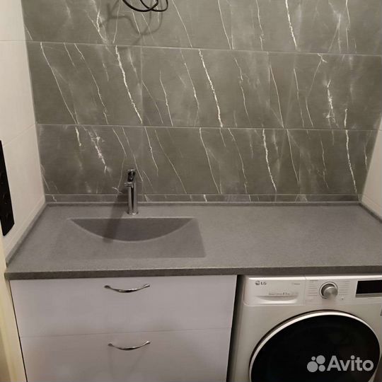 Каменная раковина для ванной