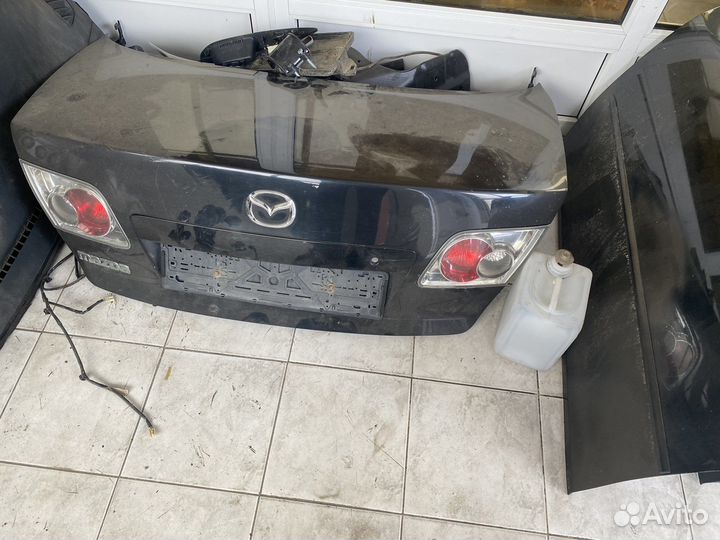 Двери на mazda 6