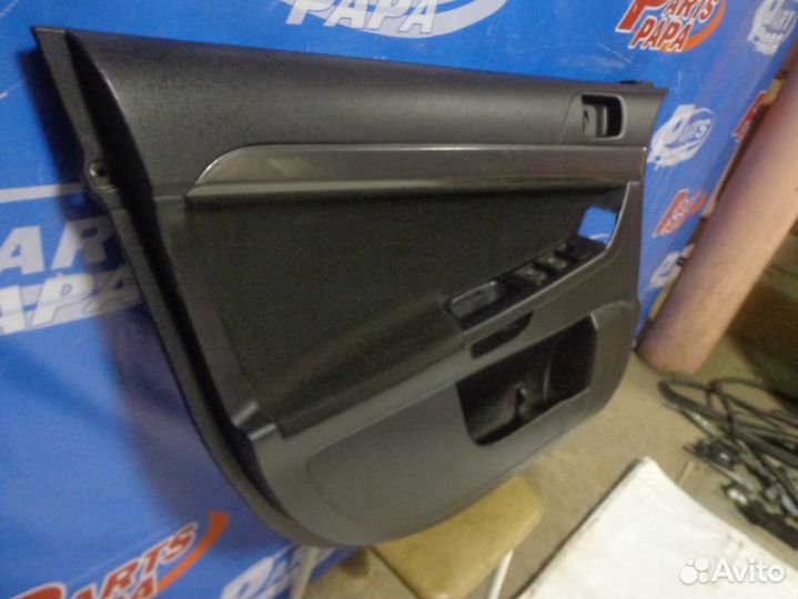 Обшивка двери передняя левая Mitsubishi Lancer 10