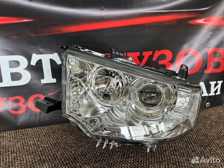Фара левая Mitsubishi Pajero Sport 2008