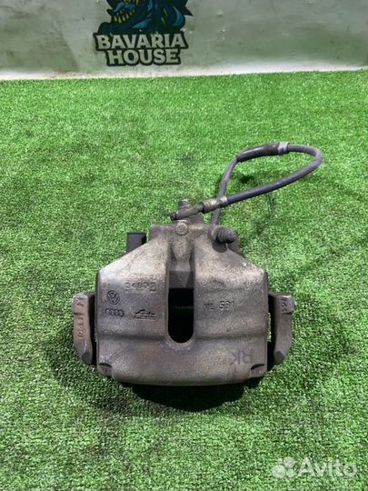 Суппорт передний левый Volkswagen Passat B6 CDA