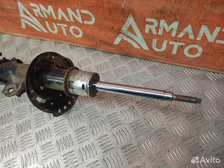 Стойка амортизатора передняя левая Kia Rio 3 QB