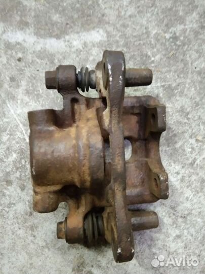 Суппорт задний Митсубиси Лансер 10