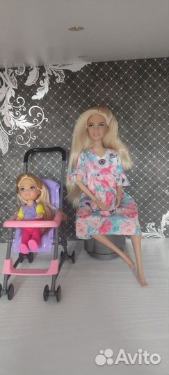 Беременная София и кукла дочь