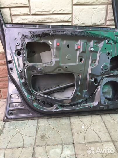Дверь передняя левая auris