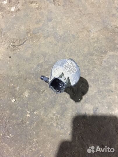 Моторчик омывателя Форд седан хетчбек