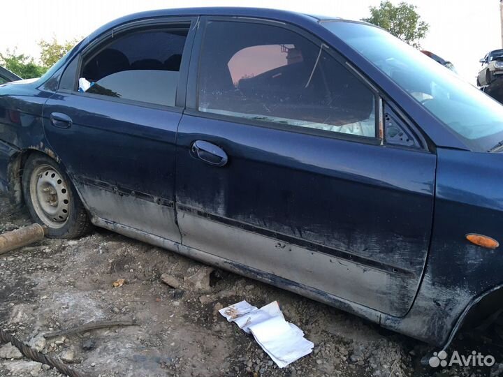 Двери на Kia spectra