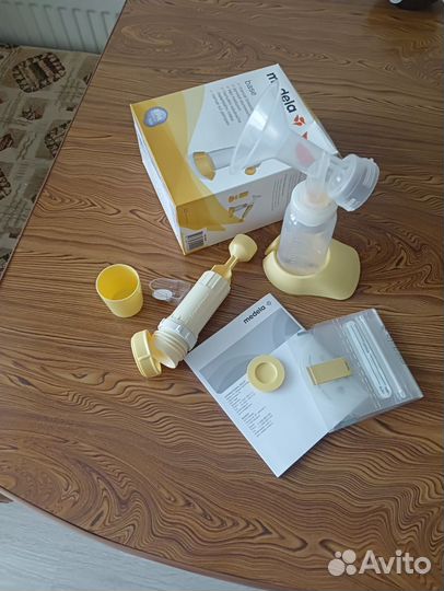 Молокоотсос medela