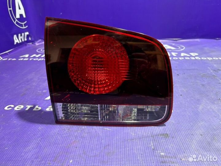 Фонарь в крышку багажника левый Volkswagen Touareg