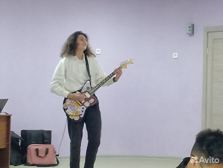 Преподаватель по гитаре