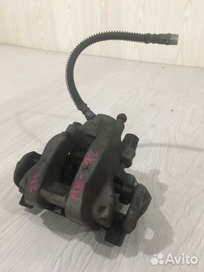 Суппорт тормозной задний левый Mercedes Benz E230