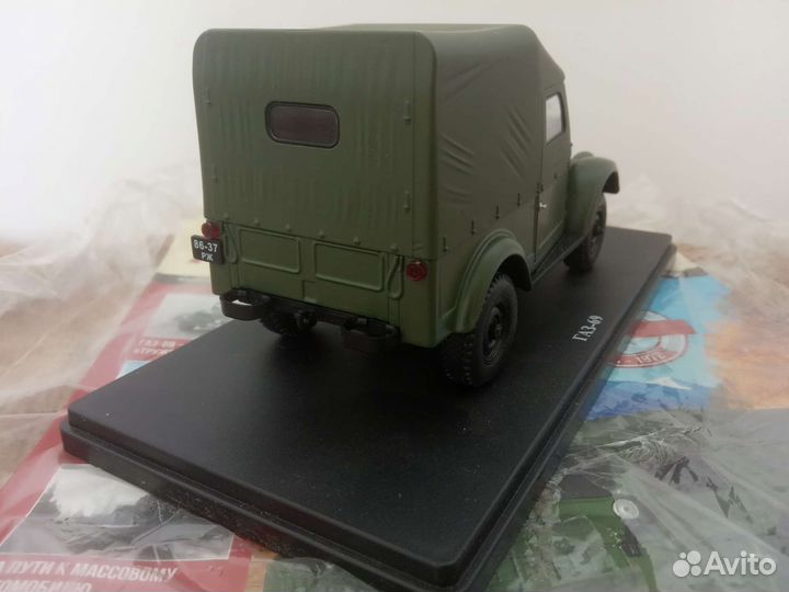 Модель автомобиля газ 69 в масштабе 1/24