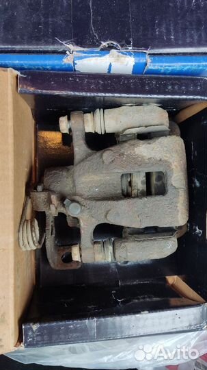 Суппорт тормозной задний kia rio 3 дорестайл