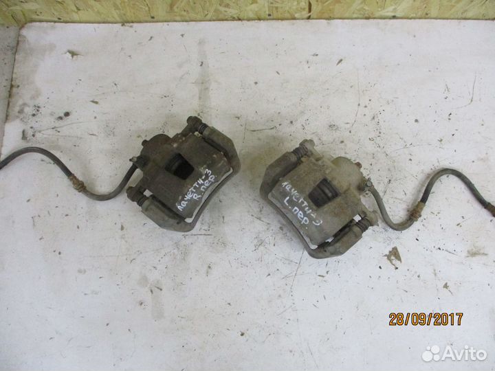 Суппорт передний Шевроле Лачетти