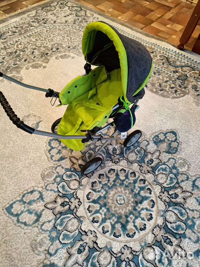 Игрушечная коляска для кукол