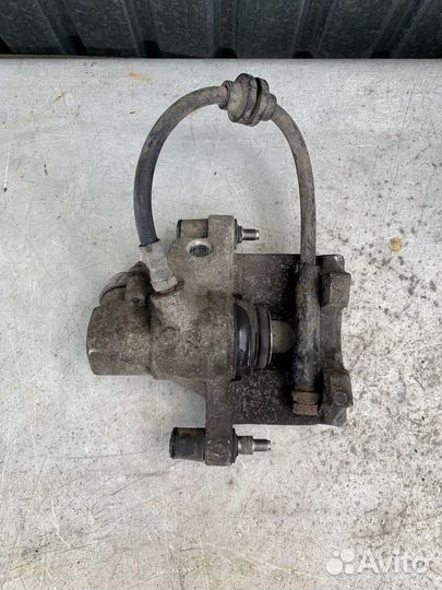 Суппорт зад. левый Mazda 3 BL