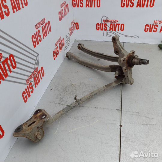 Кулак поворотный задний левый Hyundai Accent седан