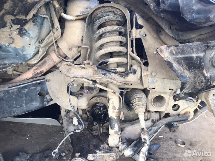 Мицубиси Паджеро спорт передние стойки