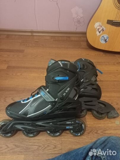 Роликовые коньки